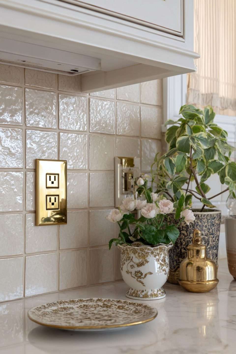 a brass outlet cover